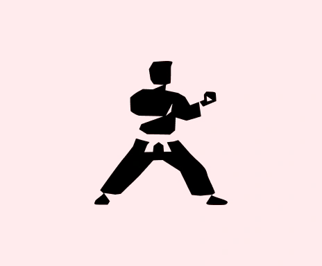 A black silhouette of a person in a karate stance.