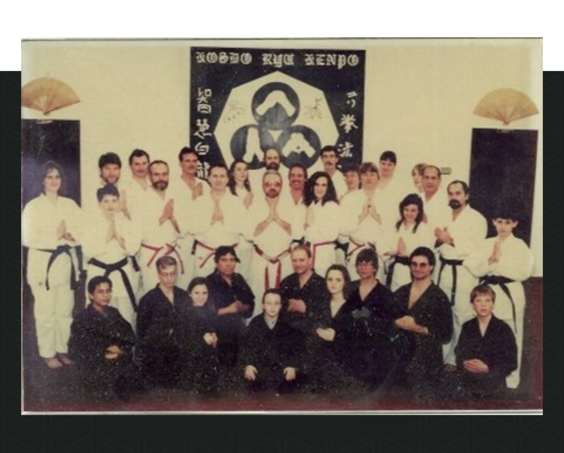 A group of people in black and white clothing.