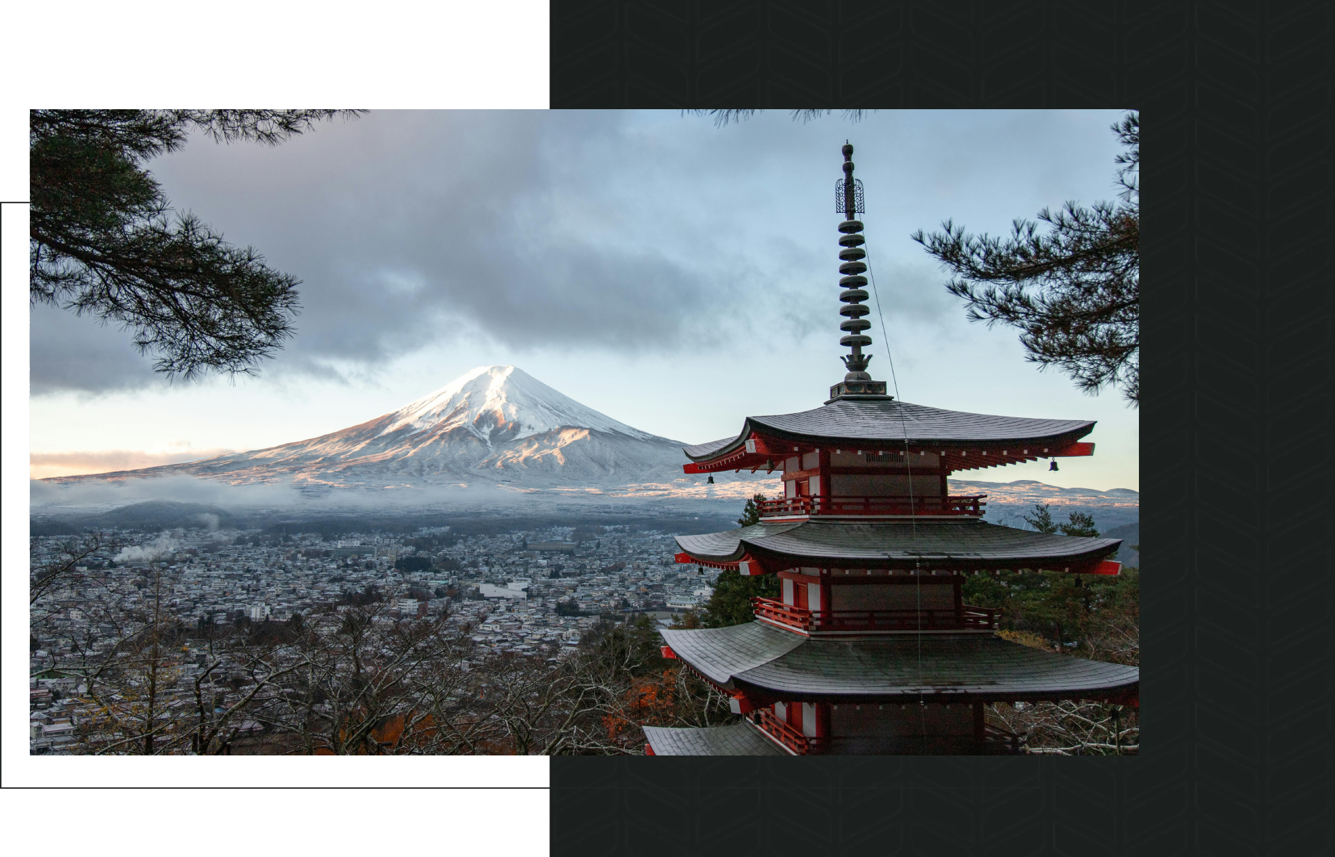 A pagoda sits in front of the mountain.